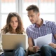 Young Couple Concerned About Money RIFT Tax Refunds